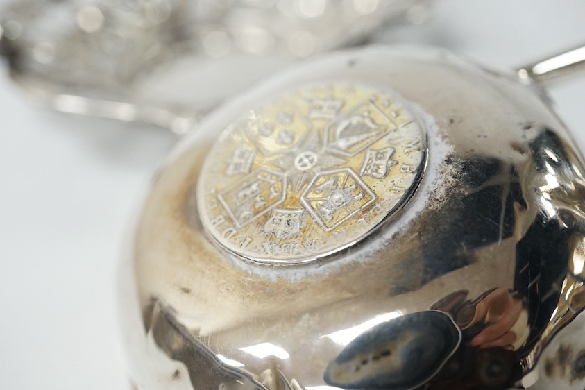 A George III silver wine funnel, by Peter & Ann Bateman, London, 1792, 12.6cm, no muslin ring, a punch ladle(a.f.) and a pierced silver bonbon dish. Condition poor to fair